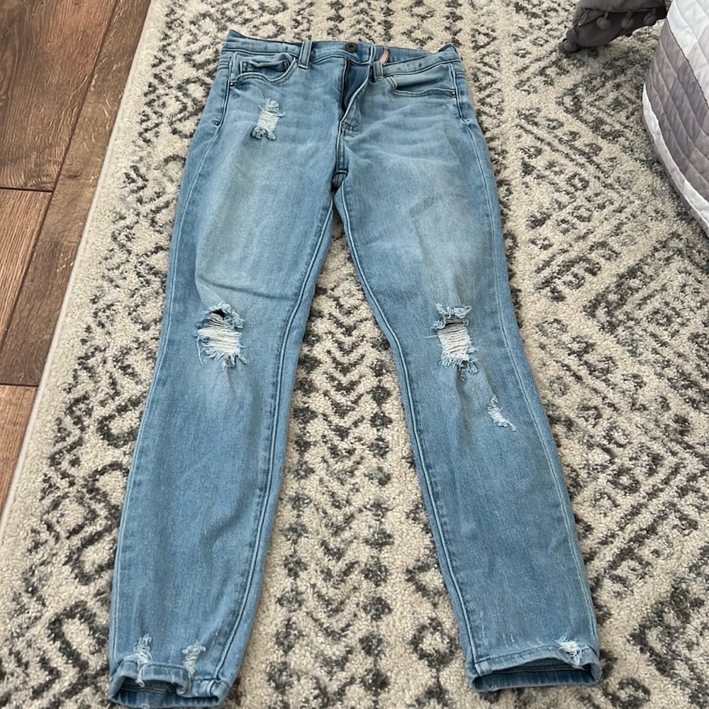 Mid rise distressed skinny jeans